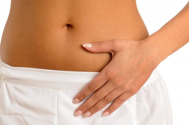 lower abdominal pain as a symptom of cystitis in women
